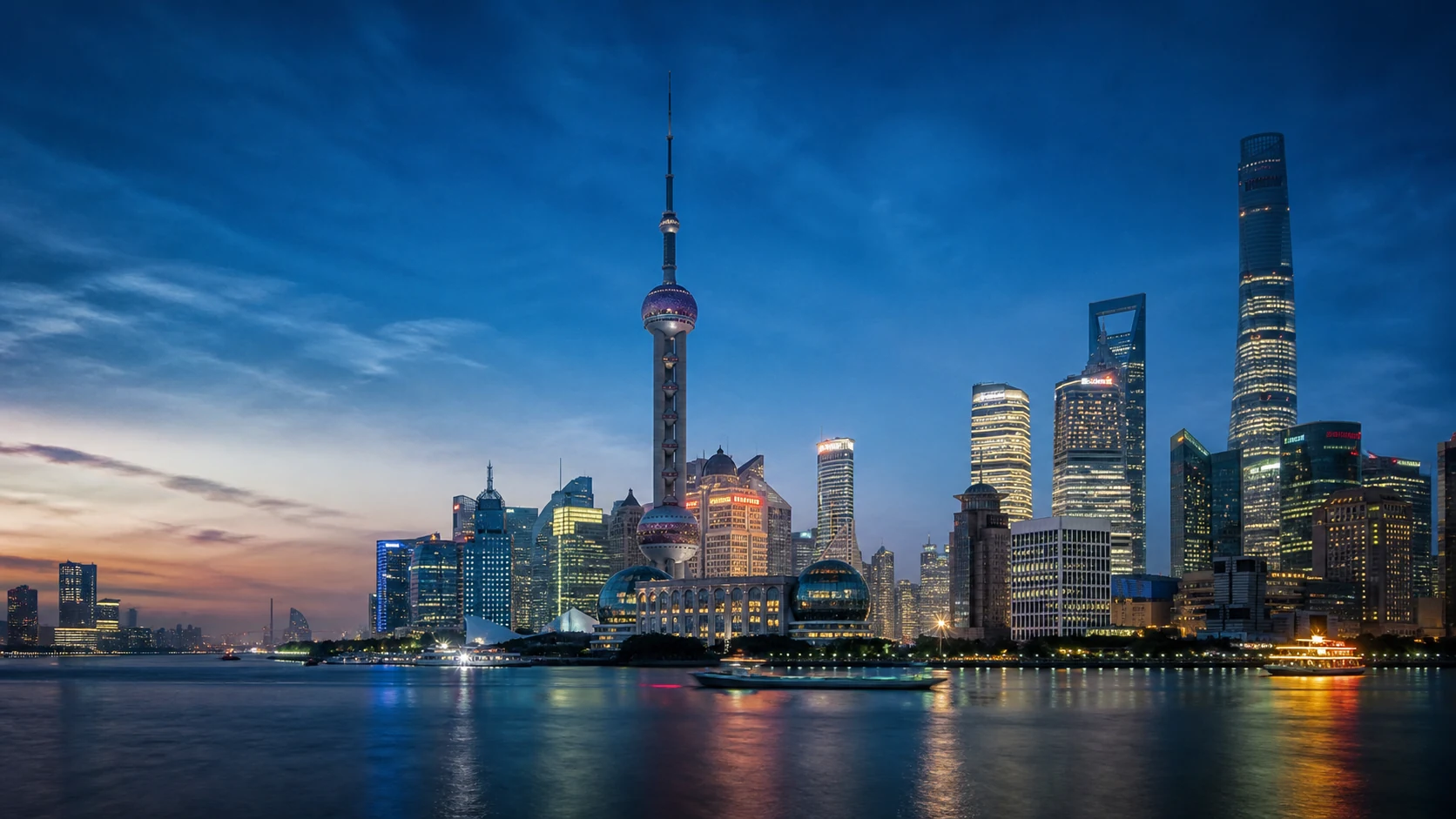Shanghai's Pudong skyline seen across the Huangpu River at blue hour